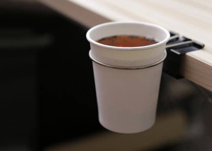 A hot cup of coffee is an elixir for all hardworking people! It instantly boosts our mood and helps us get going, no matter how tired we are! You can use this paper clip cup holder for keeping your cup of happiness handy without interfering with your documents. Toiling away in workplace won’t be a nightmare now! Happy working!