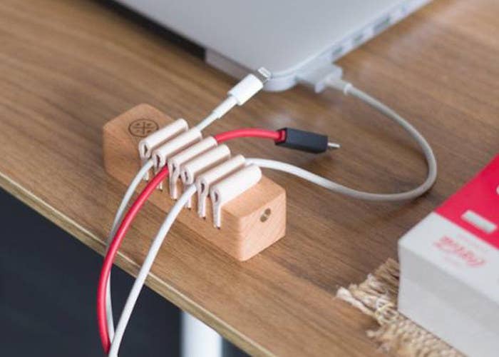 Ever thought how much your phone and laptop cables go through every time you untangle them? It’s as annoying for them as it is for you. Keep your cables and earphones neatly parked in this amazing wooden desktop cable management. Things serve best when they are treated with care and love.