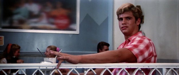 But back to Sandy! She finally meets the first person at the school (other than Frenchy) who seems to give a flying fuck about being nice to her — this athlete guy whose name I never bothered learning...