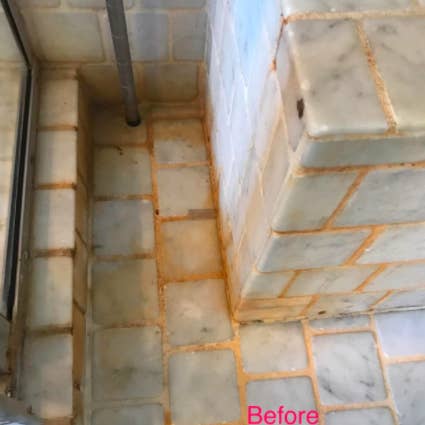 A before photo of a reviewer's grimy tile