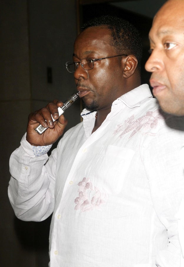 This is a picture of Bobby Brown vaping.