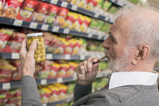 And lastly, an old man looking at olives...vaping.