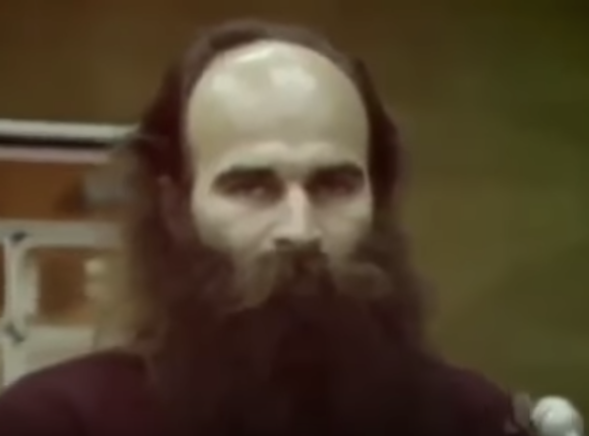 closeup of man with a long beard and balding head
