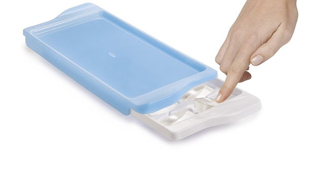 Or if you can't quit your normal-size cubes, a lidded ice tray will prevent cubes from being sacrificed to the kitchen floor gods and/or your dog.