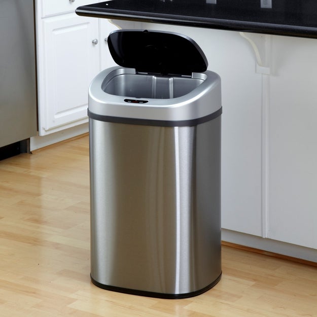 A motion-sensor trashcan that'll help you dispose of stuff when your hands are covered in raw meat germs and other icky substances that could dirty up a regular trash can lid.