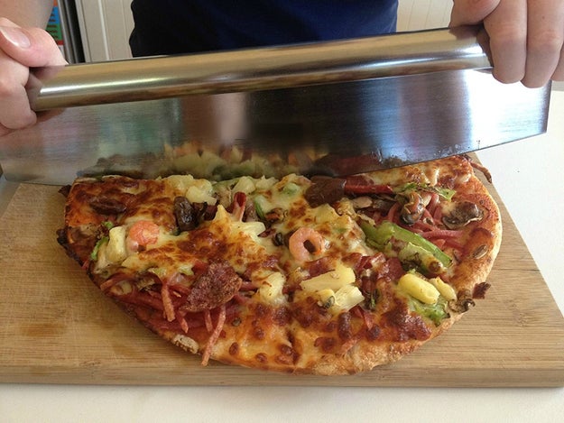 A rocker pizza cutter to feed your (already healthy) pizza habit because you'll just want to use it every dang day.