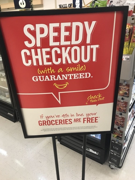 A sign that guarantees if you&#x27;re 4th in line your groceries are free