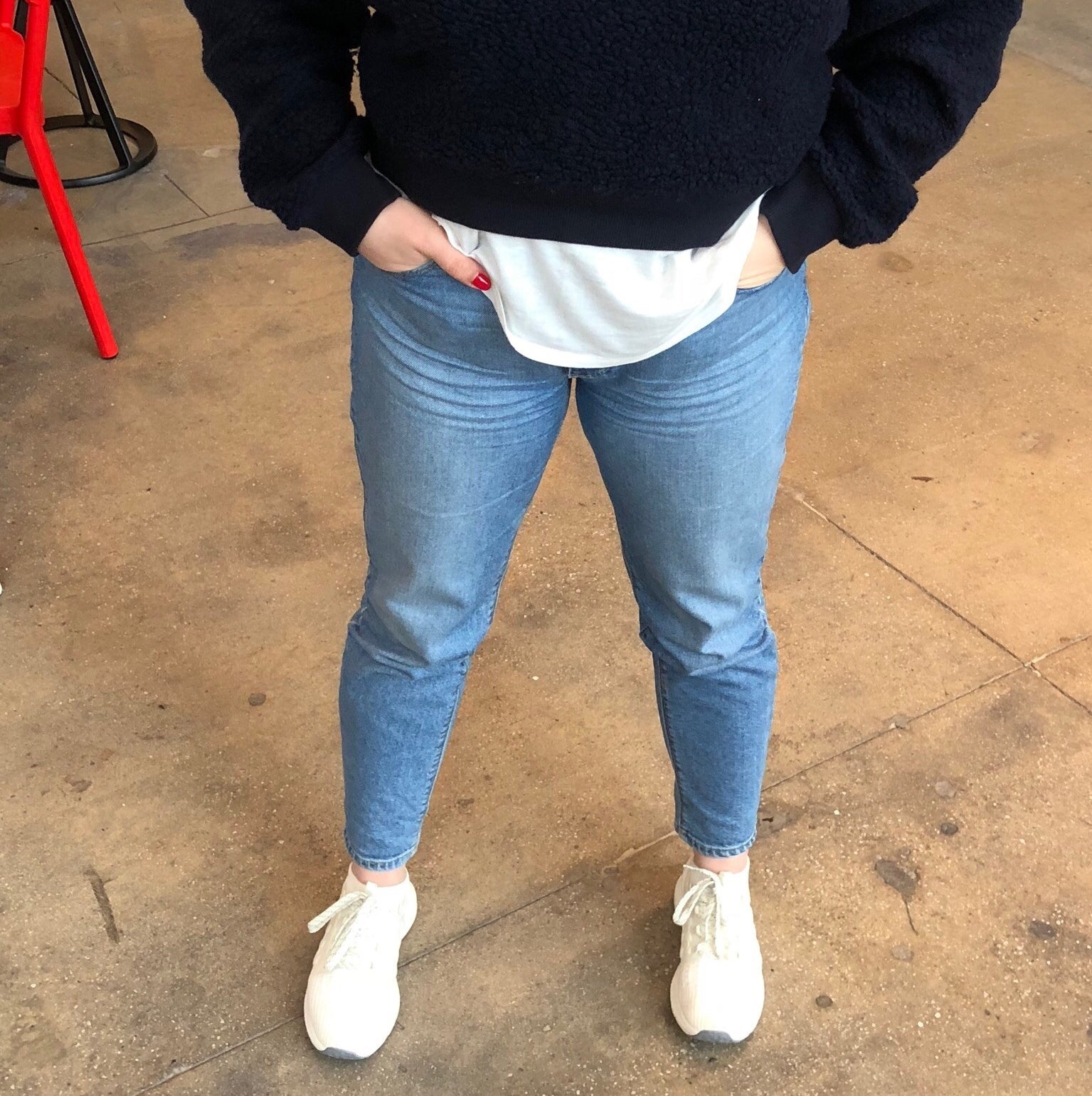 BuzzFeed Senior Writer Elena Garcia wearing the light blue jeans 