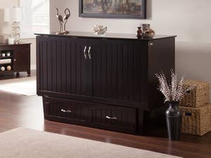 a console with two cabinet doors and two bottom shelves