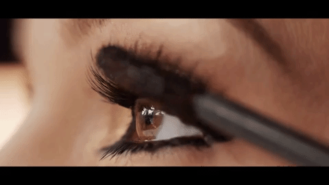 "When applying mascara, make sure to brush down on your lashes first. This coats the back of your lashes so that after you brush them upward, you will have double the volume!" —Meg S.