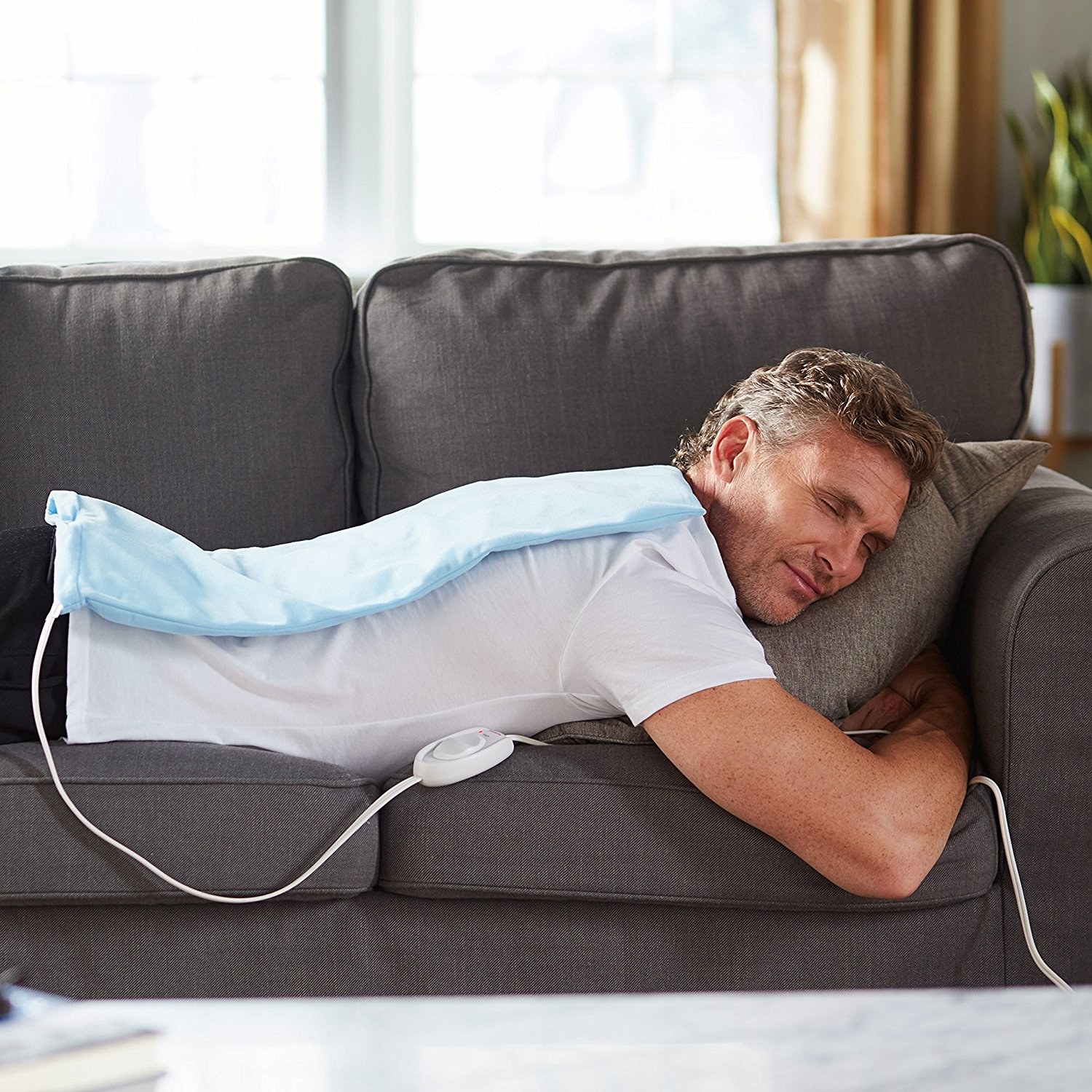 This 20 Heating Pad Is Beloved By People With Menstrual Cramps And