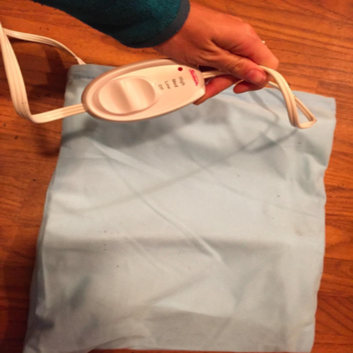 This 20 Heating Pad Is Beloved By People With Menstrual Cramps And