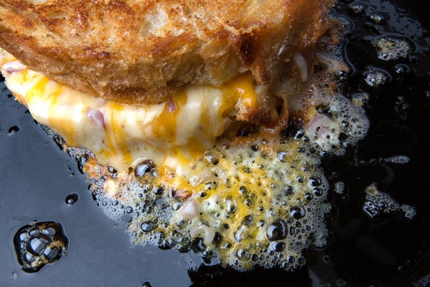 This sizzling grilled cheese teasing you with its tasteful side-cheese: