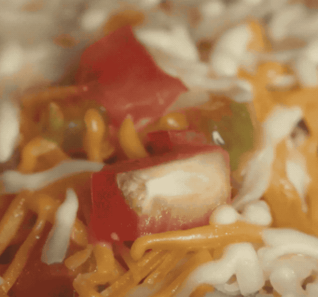 This Monterey Jack that's melting into the deep, deep crevices of these tortilla chips: