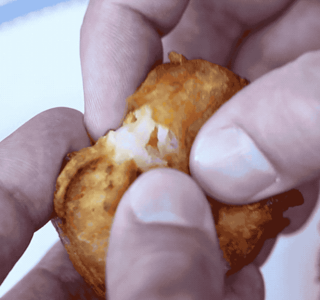 This tater tot with a cheddary surprise waiting for you inside: