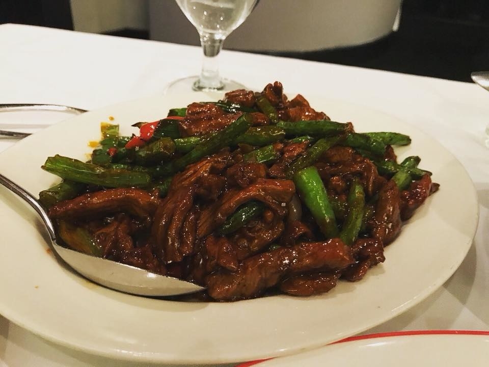 Sauteed in spicy brown garlic sauce with green and yellow pepper, the tender pieces of filet mignon - cooked to the temperature of your choice - has bold and complex flavors without compromising its authentic root of this traditional Beijing dish.