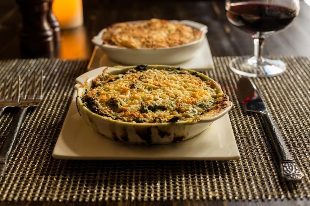 For the sides to accompany your main dishes, choose from a wide selection of items, including creamed spinach, sauteed mixed mushrooms, baked sweet potatoes with manchego, truffled mash potatoes, creamy polenta, and more.