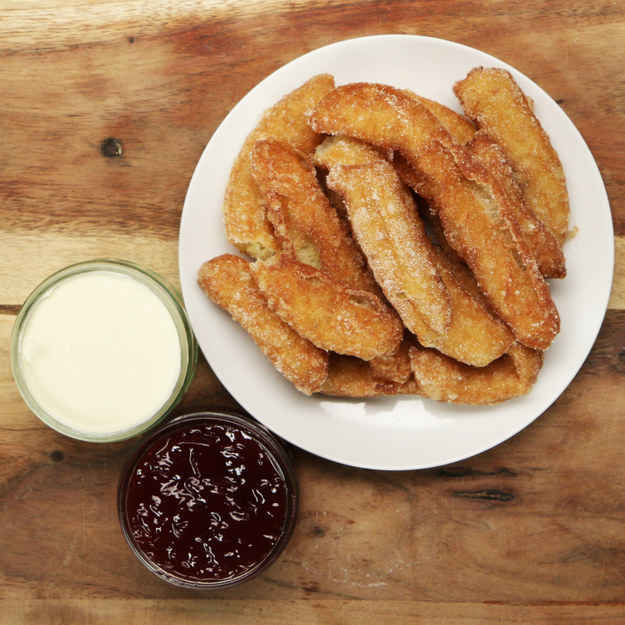 10 piecesINGREDIENTS140 g (1 1/8 cups) flour1 pinch salt2 teaspoons caster sugar1 lemon, zested120 g (1/2 cup) butter1 teaspoon vanilla extract3 egg cinnamon sugar, cinnamon and caster sugar mixed strawberry jam, to taste clotted cream, to tasteSpecial Tools piping bag, with star nozzlePREPARATION1. Sift flour into a large bowl, with a pinch of salt, caster sugar and the zest of one lemon. Mix.2. In a large saucepan, add the boiling water, butter and vanilla extract. Heat gently until the butter is melted.3. Once the mixture in the saucepan is boiling, turn off the heat and add the flour mixture. Beat quickly until lump free and leave to cool for 5 minutes.4. Beat in three large eggs one by one until the mixture is thick and sticky. Leave to cool for another 10-15 minutes.5. Transfer churro mixture into a piping bag with a wide star nozzle.6. Heat oil in a large saucepan until 180°C (350°F). Pipe the churro mix into the oil, snipping the end with scissors. Cook 3-4 at a time. Cook for 5 minutes until golden brown.7. Drain the churros on some kitchen towel, then coat in a cinnamon sugar mix.8. Serve with strawberry jam and clotted cream for a delicious twist on afternoon tea!9. Enjoy!