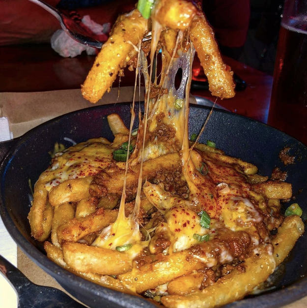 This chili cheese that's dripping onto every last fry on the plate: