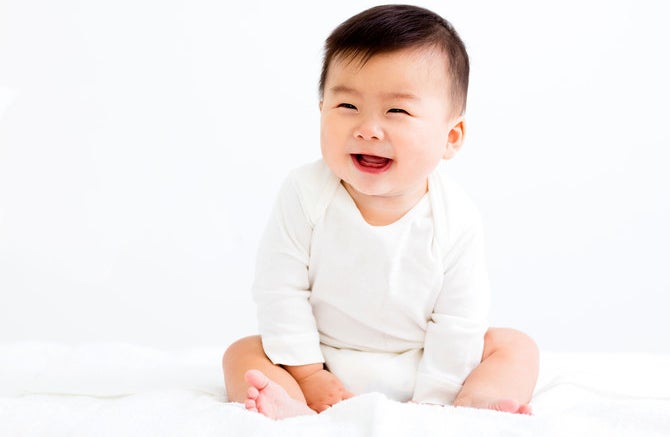 Some babies act a certain way to see if they can trigger a smile from their parents.