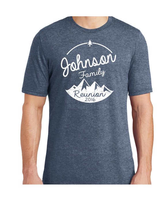 Model wears a Johnson Family Reunion 2016 shirt with a mountain landscape in the background of the shirt design. 