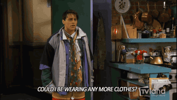 Gif of Joey from \"Friends\" saying \"Could I be wearing any more clothes?\"