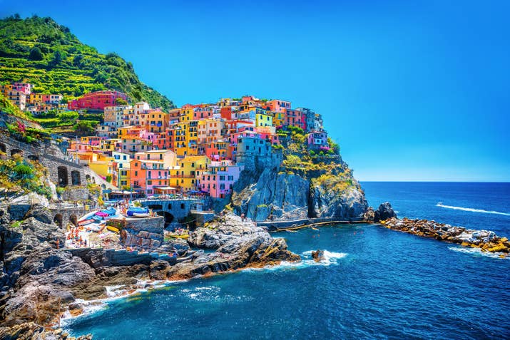 Located on the Italian Riviera, Cinque Terre is comprised of &quot;five lands&quot; and is a UNESCO World Heritage Site. This is a popular tourist destination, and the colors of the landscape is only part of its charm.