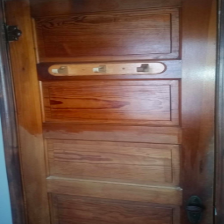 reviewer pic of half the door looking shiny and second half looking dried out