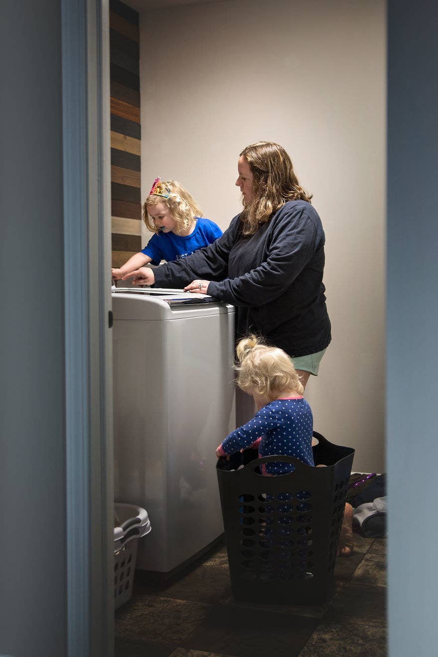 Funny Photos of a Mom Going Down a Laundry Shoot