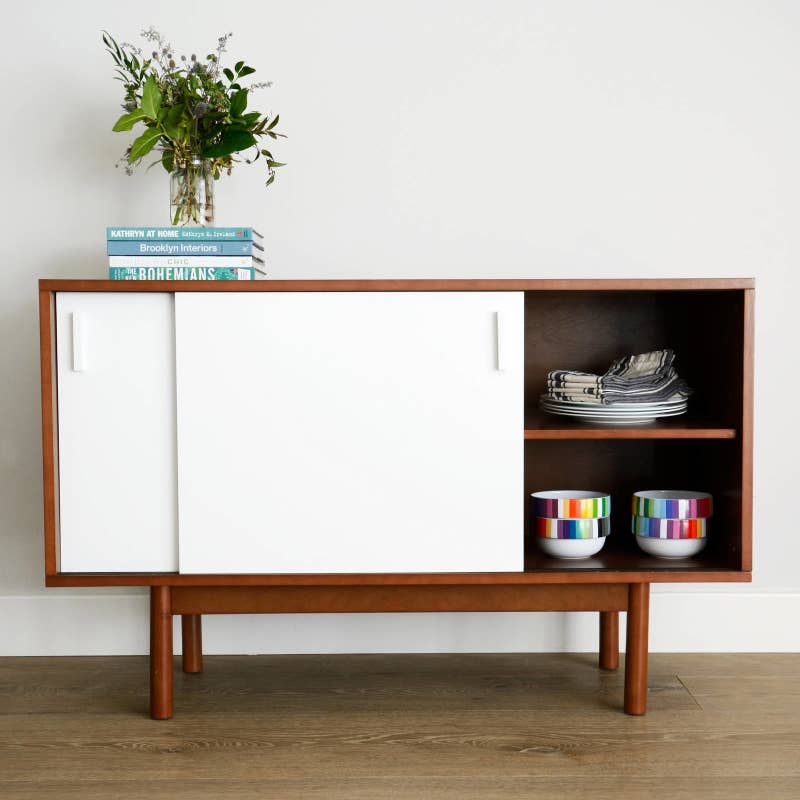 Promising review: "I thought I would have to spend 0+ on something that would satisfy my needs, but not really the look I wanted. I was thrilled when I came across this credenza for far less than 0. I am a 50-year-old woman and put this together by myself in much less time than other projects I've tackled. This credenza is very sturdy and offers a lot of useful storage space for the size. I love the clean, simple look that blends well with a large wood daybed and brass and glass desk I have in the same room. If you are looking for a very functional piece of furniture at an extremely low price, don't hesitate to take a chance with this. It will not disappoint!!" —BethPrice: 9.98