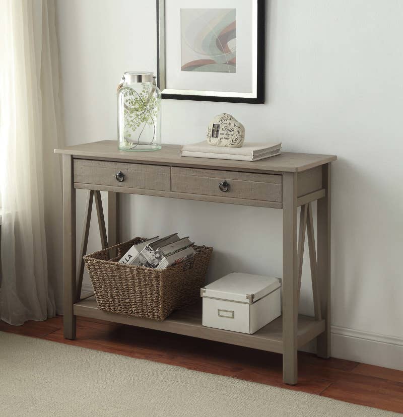 Promising review: "This is a great entry/sofa table, and the price was a steal!! The size was perfect for my semi-narrow entryway — just what I've been looking for. The table was very easy to put together. The table did come with a visual diagram with everything numbered and it was very easy to follow. The table looks like I paid several hundred dollars for it." —cardsfan1Price: 0