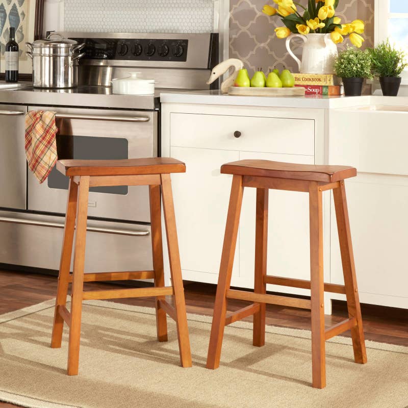 Promising review: "I am very happy with these stools! They were quite simple to assemble with the tools provided — it took me less than 30 minutes. They are solid wood, very sturdy, and they look great at my kitchen breakfast bar. The seats are wide enough to be comfortable. You just can't beat these stools for the price! I saw them on other sites for each and you had to pay shipping on those, too. The stools arrived a week before the estimated delivery. —DavenportJPPrice: .46+ (available in three sizes)