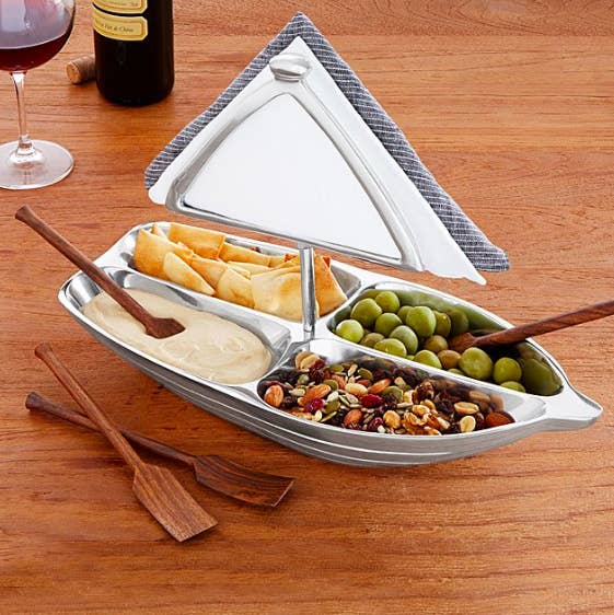 sail boat shaped tray with four divided sections for snacks and four paddle shaped spoons