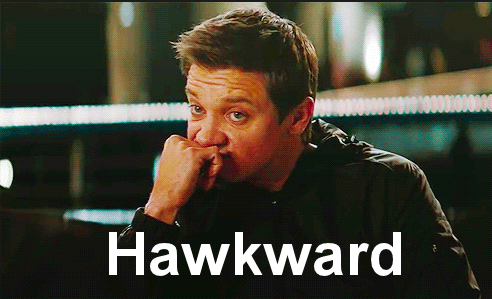 Jeremy Renner putting his hand to his mouth with the word &quot;hawkward&quot;
