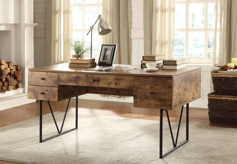 Promising review: "Beautiful! This desk looks just like the reclaimed wooden ones selling for over 00. VERY large in person and quite heavy, but definitely worth it. My husband has desk envy and is returning his desk and purchasing this one instead! Feels like a very high quality desk (definitely a steal for the quality)." —AHoffman1991Price: 1.99