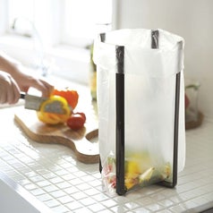 the bag holder holding chopped vegetables