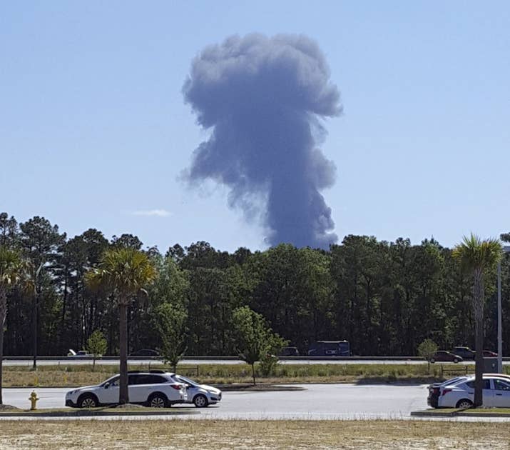Smoke rises from the crash site on May 2, 2018.