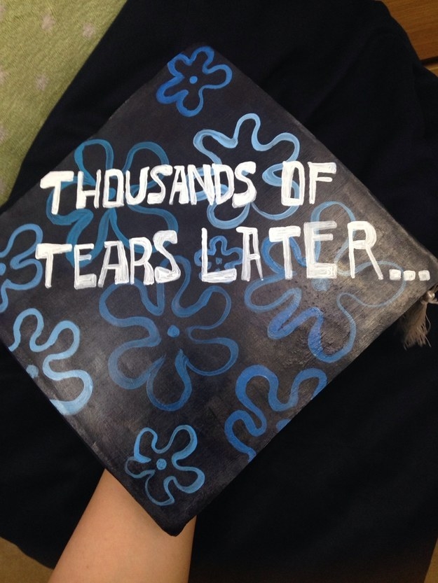 Graduation cap painted with the words &quot;Thousands of Tears Later&quot; and the Spongebob pattern