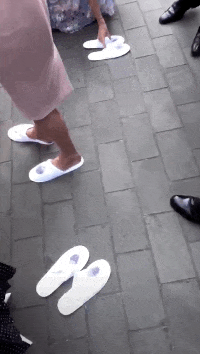 Like did you know that the new couple made sure guests were given slippers to rest their feet after the long ceremony?
