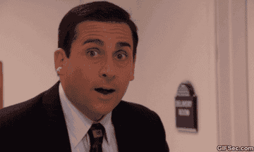 Michael Scott from The Office looking pleasantly shocked