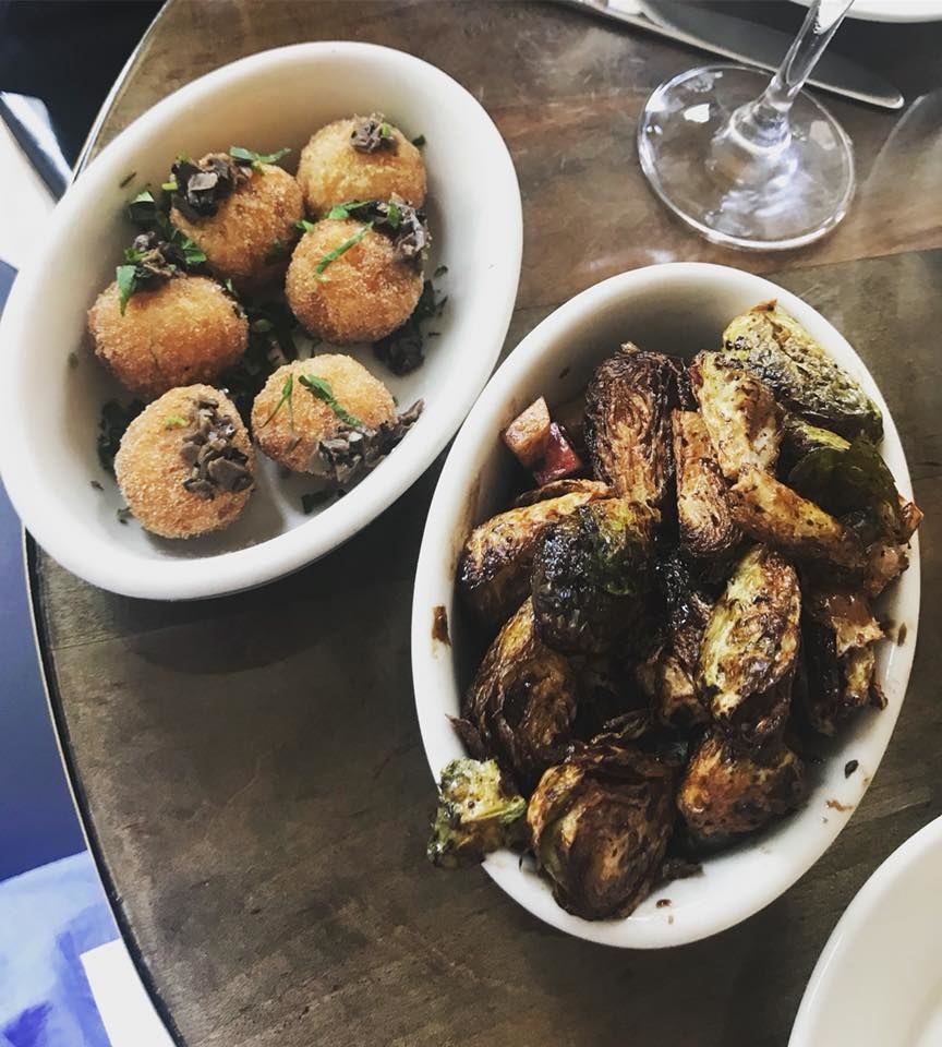 Perfect for sharing, the Truffled Risotto Croquettes features six bite-sized and deep-fried risotto balls that are perfectly crispy on the outside with rich flavor of the risotto. The Crispy Brussel Sprouts have beautifully charred exterior with crunchy Fuji apples