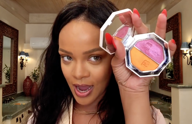Product 1: After she applies foundation and contours her face, she very casually shows the camera a super vibrant orange and magenta compact. The packaging looks the same as her Killawatt highlighters, but only time will tell what they are.