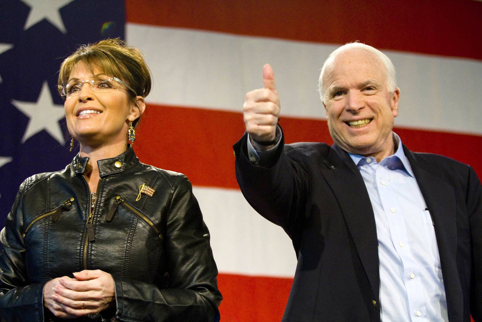McCain and former Alaska governor Sarah Palin attend a campaign rally at the Pima County Fairgrounds on March 26, 2010, in Tucson, Arizona.