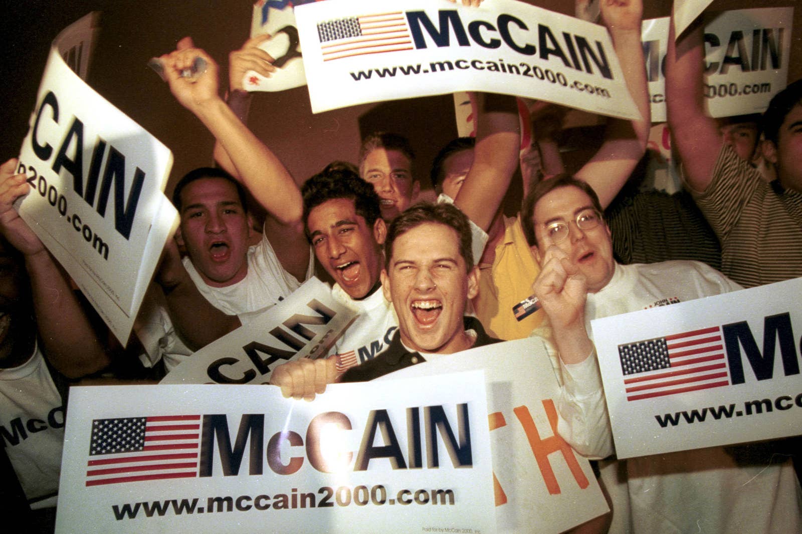 Supporters of McCain gather outside the venue of the GOP debate on the campus of Arizona State University in Tempe, Arizona, on Nov. 21, 1999.