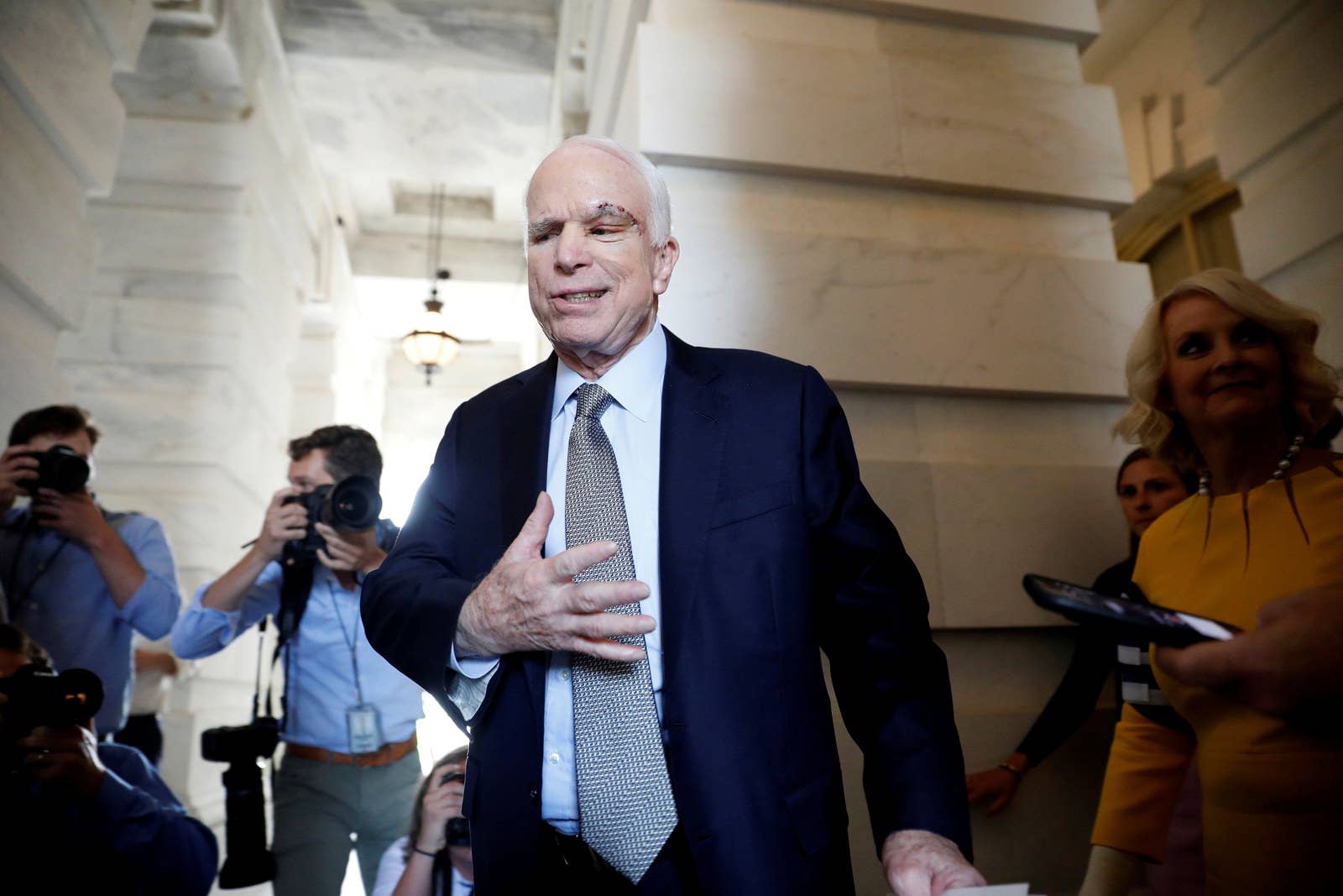 McCain, recently diagnosed with an aggressive form of brain cancer, departs after returning to the Senate to vote on health care legislation on Capitol Hill on July 25, 2017.