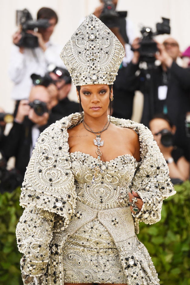Dolan also joked during the interview that Rihanna borrowed the headpiece typically worn by bishops from him. "She gave it back to me this morning," he said with a laugh. "She was very gracious.”