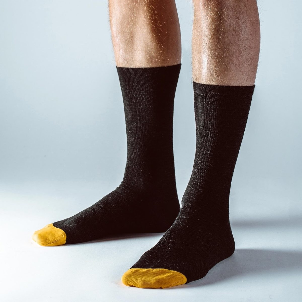 This pair of socks is designed to hold up from morning to night. Truly odor-resistant, Merino fibers carry an alkaline charge that attracts the acidic molecules in sweat, thus neutralizing unwanted odors. 100% Mercerized Merino for added comfort and breathability combined with a nylon heel and toe for durability will guarantee you can wear these socks in—and not wear them out.