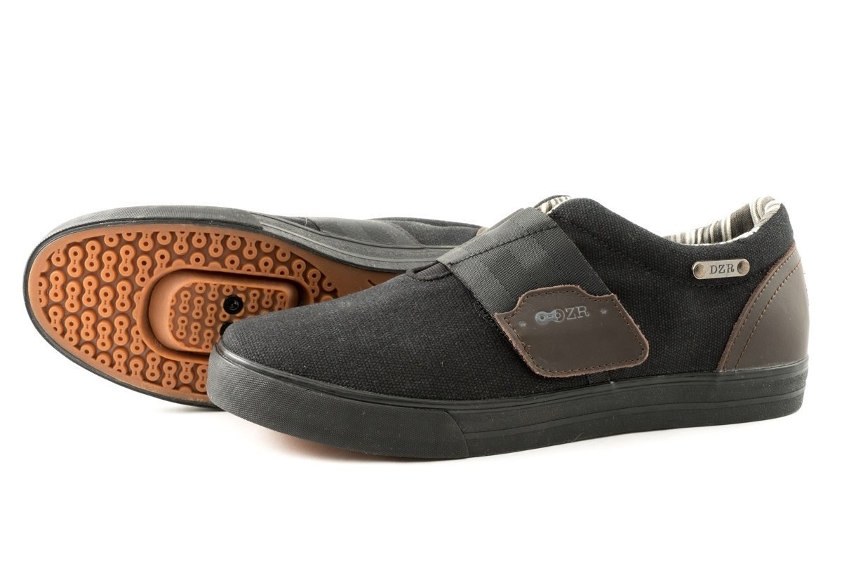 The smoothest way to hop on and off your bike is with DZR’s line of flat pedal urban bike sneakers. Smart and stylish, these shoes easily transition from bike to street without skipping a step. Performance in the most casual of packaging, the Nero is the first and only SPD compatible slip on sneaker. Featuring Variable Flex shank technology, a reflective heel badge, and a natural gum rubber sole it ensures performance in an everyday cycling shoe.