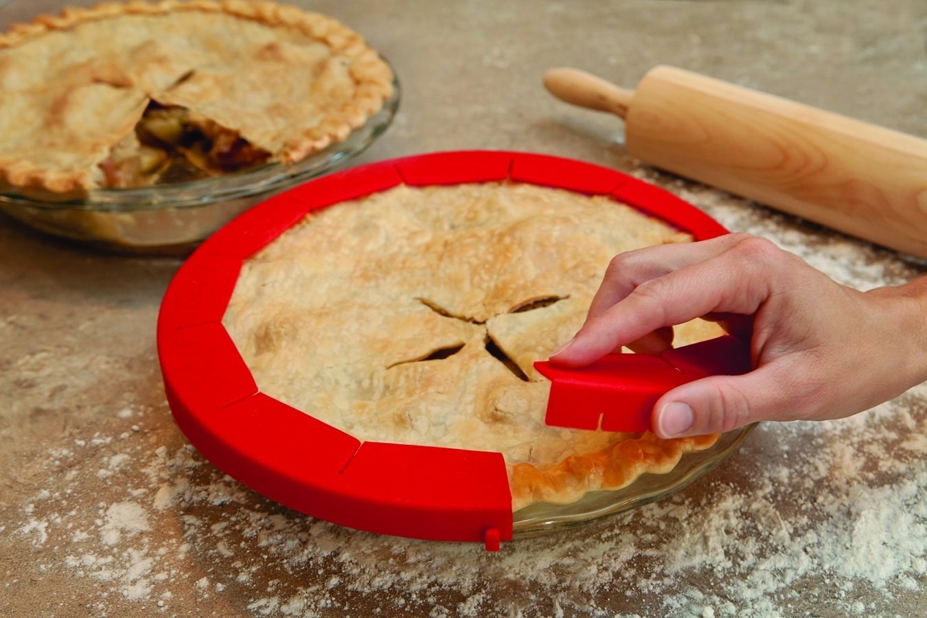It can be adjusted for any pie between sizes 8-11.5 in and withstand temps. of up to 500 degrees F. It's dishwasher-safe, and of course, reusable!"Anyone who is baking a pie needs this! And everyone should be baking pies all the time, imh(onest)o. I bake a lot of chicken pot pies and the first few times, the crust would come out burnt and ugly. I eventually started wrapping the crust in tinfoil, but this takes forever and sometimes the tinfoil falls off. Crust protectors are a total lifesaver. You just pop it right on. It saves a lot of tin foil, so it basically pays for itself." —Bek O'ConnellGet it from Amazon for $7.99 (available in four colors).