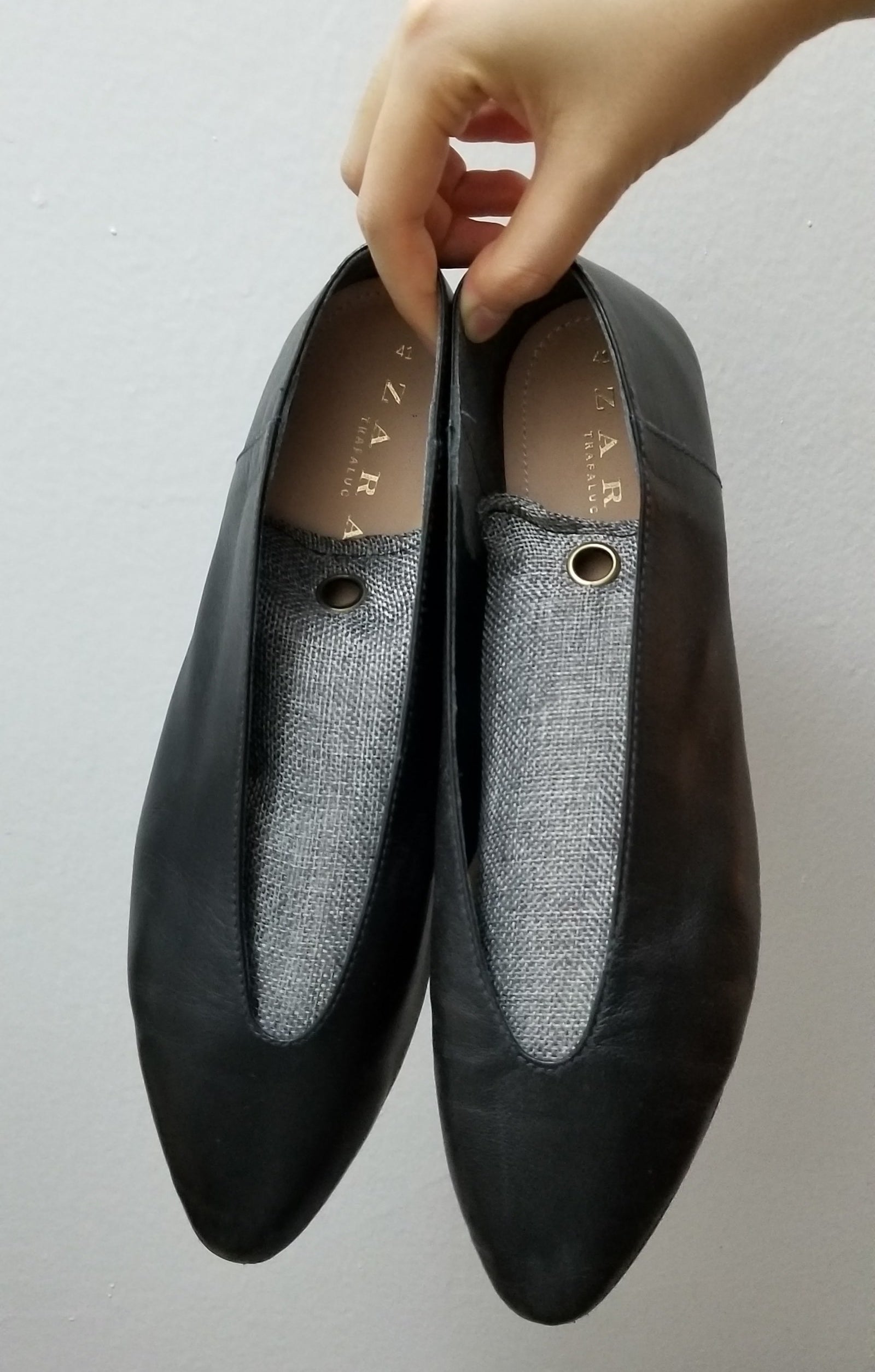 A pair of flats with the bag in them